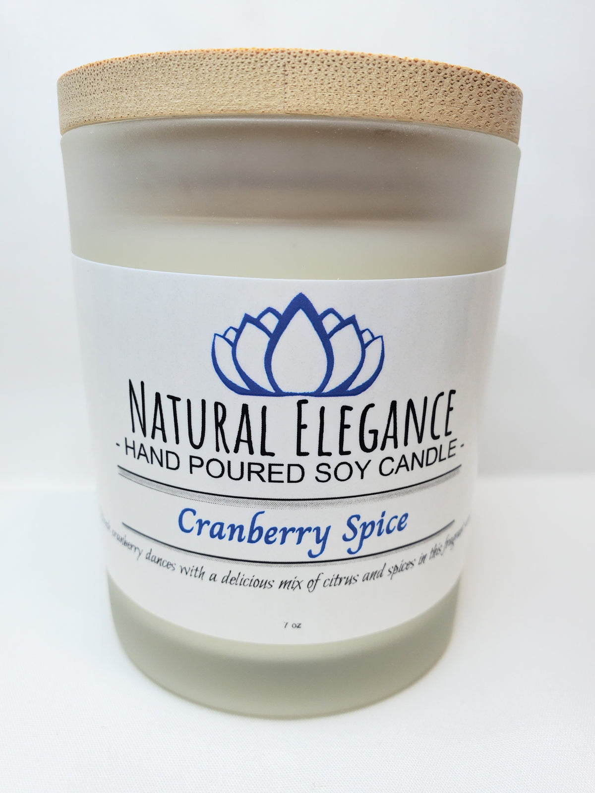 Natural Elegance Cranberry Spice soy candle with a festive, fruity cranberry and warm spice fragrance